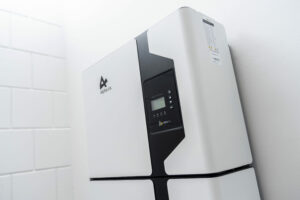 Alpha ESS Solar Battery SMILE 5 on a white wall.