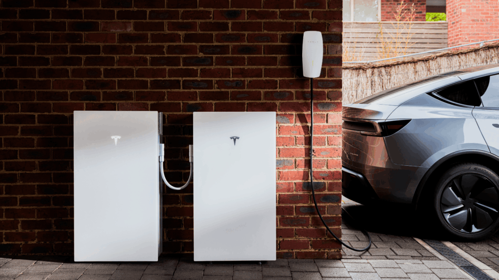 Tesla Powerwall 3, expansion pack and wall connector in a garage